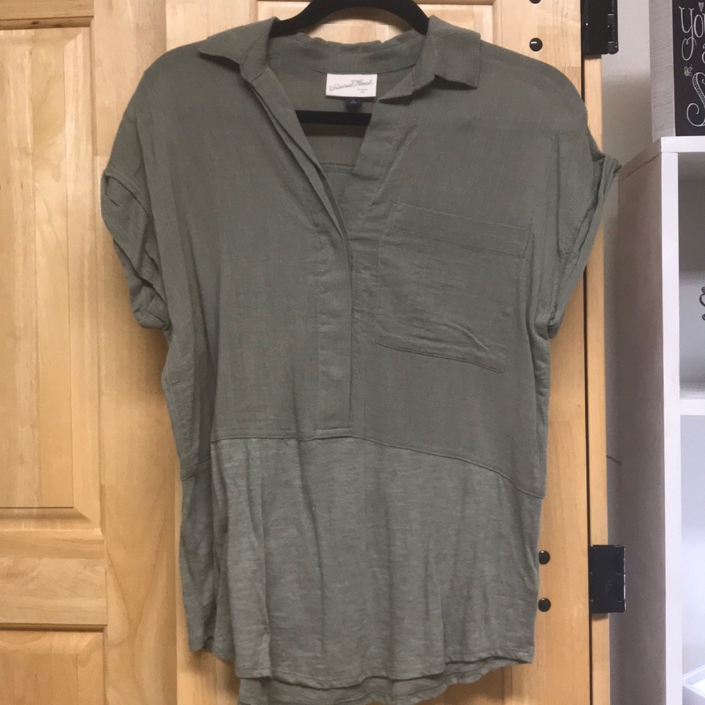 army green V-neck.